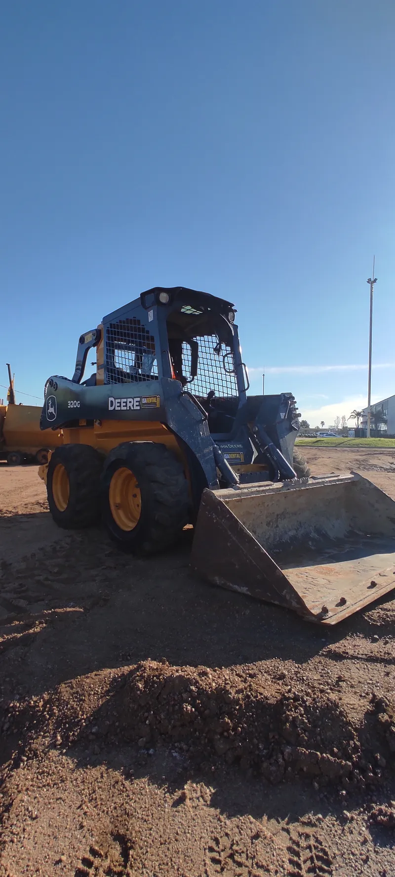 Minicargador John Deere 320G